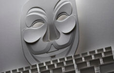 An Inside Look At Anonymous, The Radical Hacking Collective | The in Masked Mimes Associated with Christmas Crossword Clue