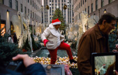 Holiday Madness In Midtown Manhattan – The New York Times with Kiss Under This Christmas Decoration Crossword Clue