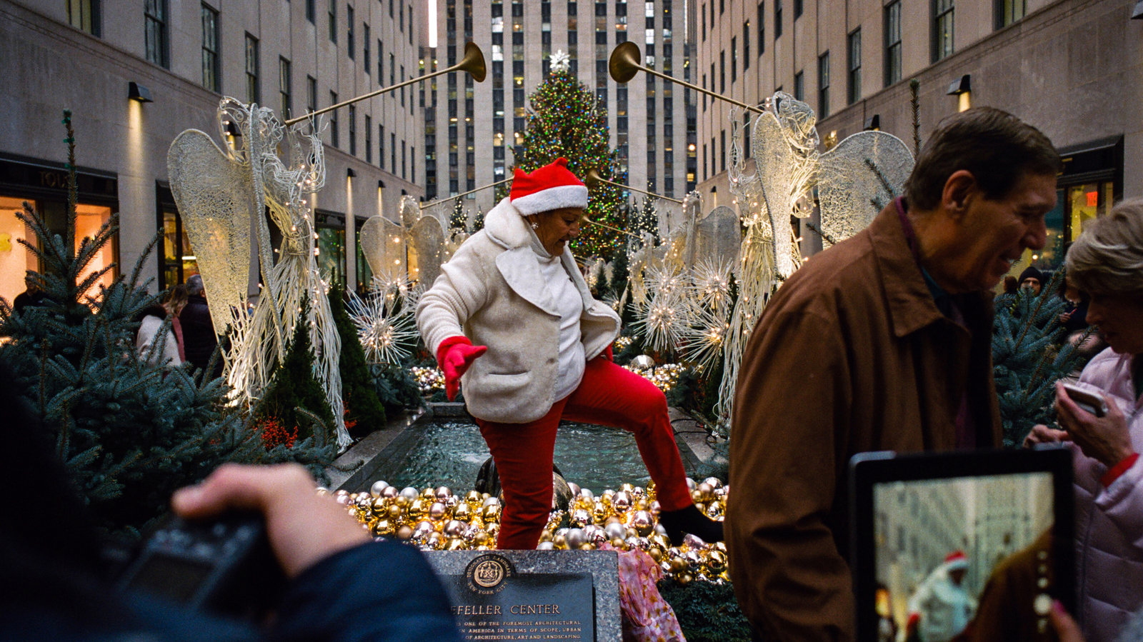 Holiday Madness In Midtown Manhattan - The New York Times with Kiss Under This Christmas Decoration Crossword Clue