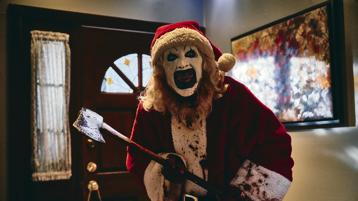 How Merry Gore Of &amp;#039;Terrifier 3&amp;#039; Beat &amp;#039;Joker&amp;#039; At Box Office - Los with regard to Masked Mimes Associated with Christmas Crossword