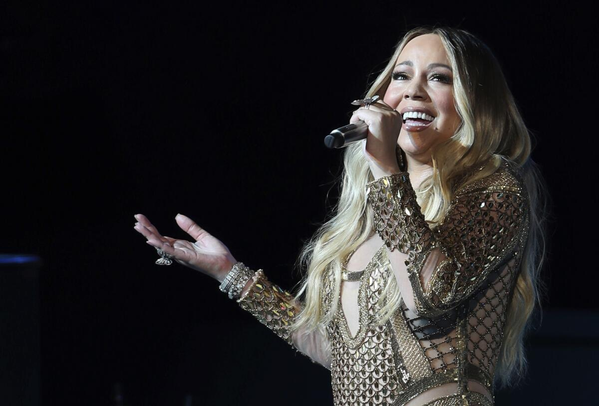 Mariah Carey&amp;#039;S &amp;#039;Queen Of Christmas&amp;#039; Trademark Upsets Singers - Los inside Carey Known As The Queen Of Christmas Crossword